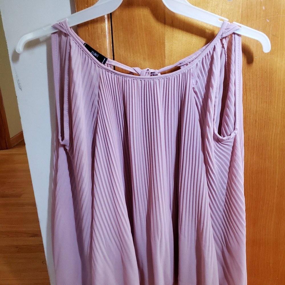 Top with Peek a boo shoulder and tie back